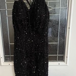 I am selling a prom dress from shein the size is small and color is black